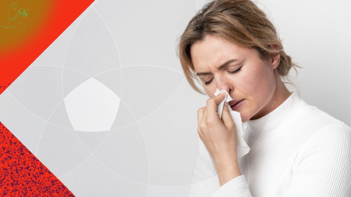 Pessoa segurando o nariz para estancar um sangramento nasal, mostrando primeiros socorros simples